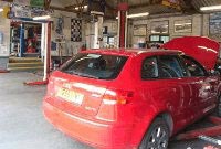 Red Car being fixed at Clover Autos